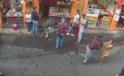 女子街頭裸奔竟是「狂追搶匪」 路人反應讓人吃驚