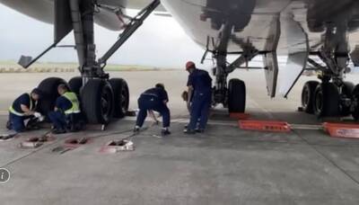 颱風巴威逼近 華航747貨機進行航機防颱束機作業