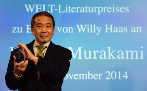 日本作家村上春樹昨赴德國柏林領文學獎，鼓勵香港「佔中」的年輕人，打造一個沒有高牆的世界。（法新社） 