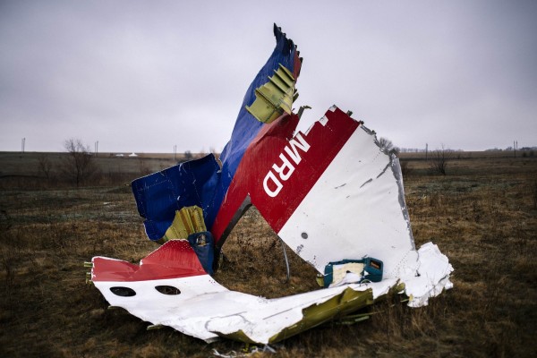 馬航MH17班機去年在高空飛行時遭飛彈擊中，發生墜機事故，（法新社）