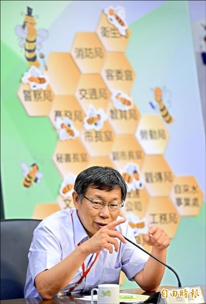 台北市長柯文哲昨天表示，針對十二年國教已和新北市長朱立倫達成共識，八月將公布細節。（記者張嘉明攝）