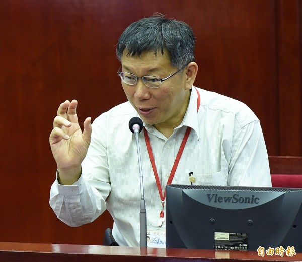台北市長柯文哲至市議會備詢，被問到一中問題。（記者簡榮豐攝）