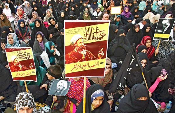 巴基斯坦什葉派穆斯林三日在第一大城喀拉蚩集結抗議。（歐新社）