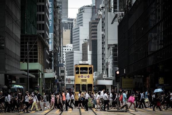 全球平均工時最長的城市由香港奪冠。（法新社）