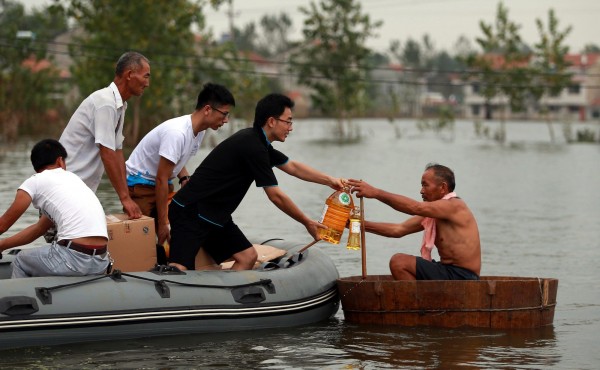 中國華北地區近日降下暴雨引發洪災，至少造成161人死亡、123人失蹤，受災人數達到1436.6萬人，其中又以河北、河南、山西的災情最為慘重。（歐新社）