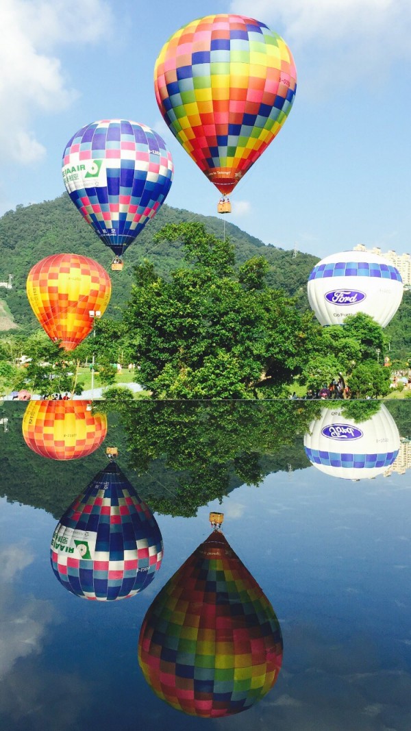 大雨攪局，石門水庫熱氣球嘉年華活動順延。（觀光旅遊局提供）