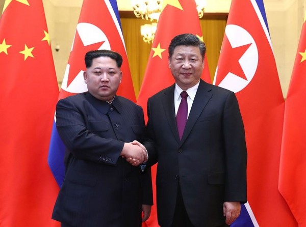 新華社今天證實傳言，北韓領導人金正恩在本月25日至28日密訪北京，與中國國家主席習近平會談（圖擷自新華社）