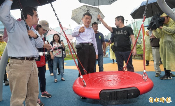 圖台北市長柯文哲出席大港墘公園完工啟用記者會。（記者張嘉明攝）