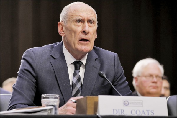 美國國家情報首長寇茲（Dan Coats）警告，北京將繼續透過施壓、利誘，迫使台灣接受統。（彭博）