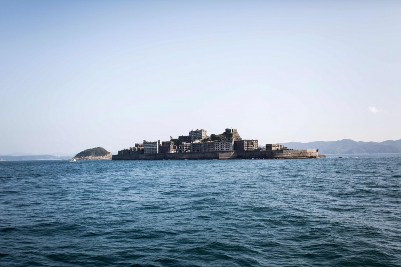 世界文化遺產之一的端島(軍艦島)因石棉超標,即日起暫停開放登島。(法新社) 世界文化遺產之一的端島(軍艦島)因石棉超標,即日起暫停開放登島。(法新社)