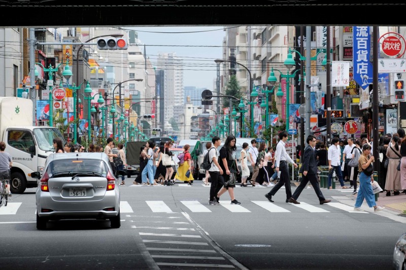 日本教授因買春後對女子念念不忘，竟查出女子住處不斷跟蹤。圖為日本街景。（法新社）