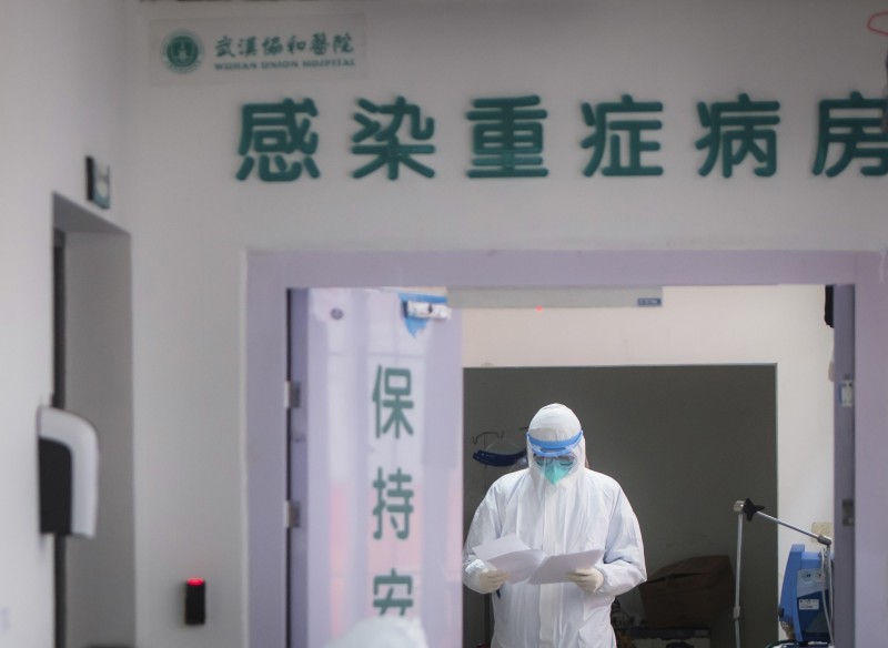 武漢官方宣稱住院的確診患者「全數清零」，引起各方質疑。（美聯社）