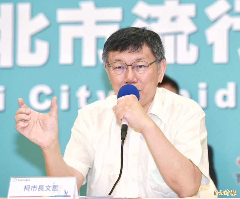 台北市長柯文哲今受訪表示，台北市的概念是「防疫、紓困、轉型」，轉型包含無現金交易和台北市鄰里數位基礎建設兩部分，另將找北一女當試辦學校，要推動校園完全的E化。（記者方賓照攝）