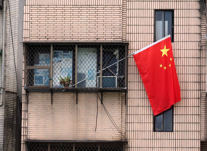 中国元旦施行新版国旗法，中网友酸风吹一下可能就犯法。（欧新社）(photo:LTN)