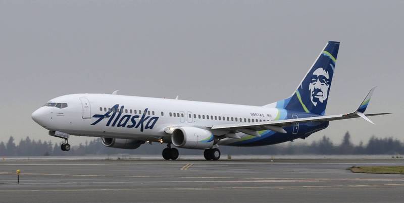 美国阿拉斯加航空有14名乘客没戴口罩还闹事，最终都被列入禁飞黑名单。（美联社）(photo:LTN)