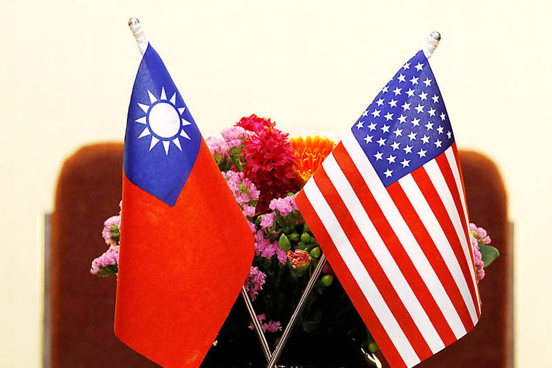 National flags of Taiwan and US are placed for a meeting between then-US House of Representatives Foreign Affairs Committee chairman Ed Royce and then-legislative speaker Su Jia-chyuan in Taipei on March 27, 2018.
Photo: Tyrone Siu, Reuters National flags of Taiwan and US are placed for a meeting between then-US House of Representatives Foreign Affairs Committee chairman Ed Royce and then-legislative speaker Su Jia-chyuan in Taipei on March 27, 2018.
Photo: Tyrone Siu, Reuters