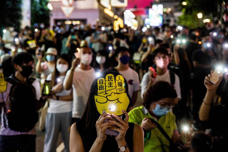许多香港市民以手机镜头代替烛光，以此纪念六四事件。（法新社）(photo:LTN)