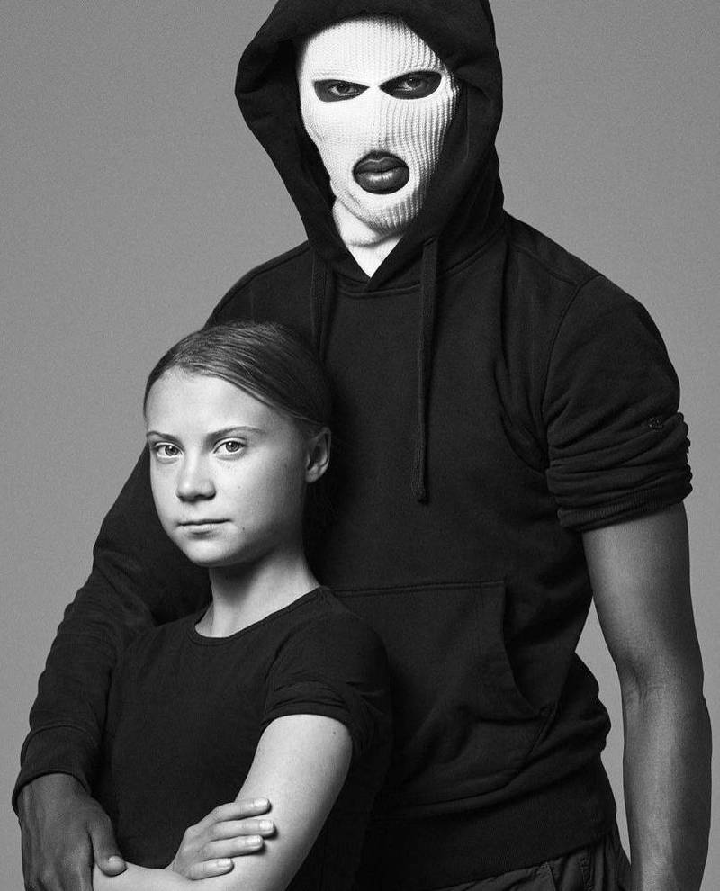 童贝里与黑帮饶舌歌手「1.Cuz」合影，宣传疫苗接种。（取自推特@OHCOMFY）(photo:LTN)