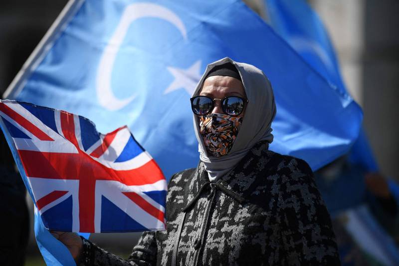 英国维吾尔族社群今年4月在伦敦示威，唿吁英国国会承认中国对新疆的迫害是种族灭绝罪行。（法新社档案照）(photo:LTN)