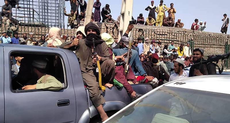 阿富汗反叛民兵组织神学士连日攻城掠地，昨日更拿下首都喀布尔。（法新社）(photo:LTN)