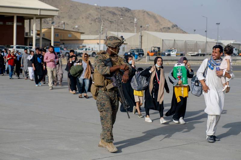 美军人员持续在喀布尔国际机场协助撤离行动，但白宫坦言，目前无法掌握还在阿国的美国公民人数。（法新社）(photo:LTN)