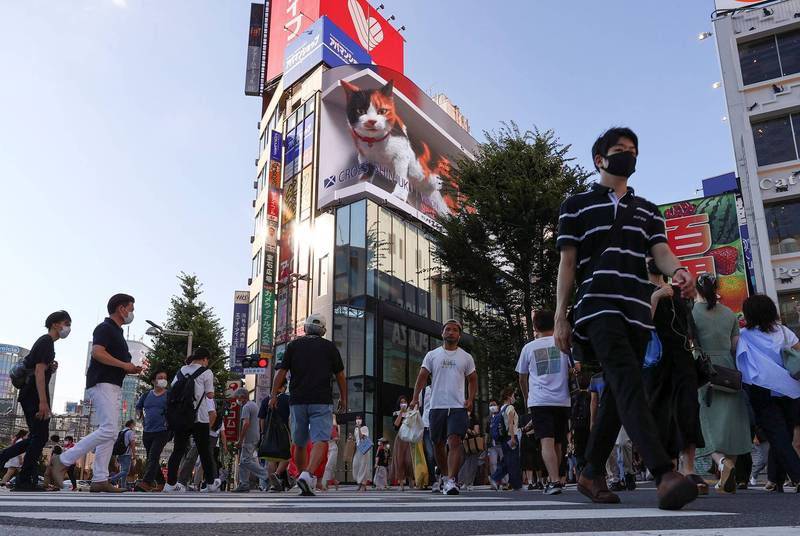 日本20日舉行線上武肺對策總部會議，彙整向中央政府的緊急建議。圖為日本街道圖。（路透）