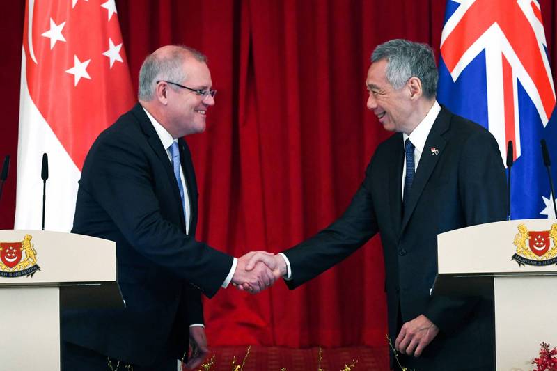 澳洲總理莫里森（Scott Morrison，圖左）與新加坡總理李顯龍（圖右）。（法新社資料照）