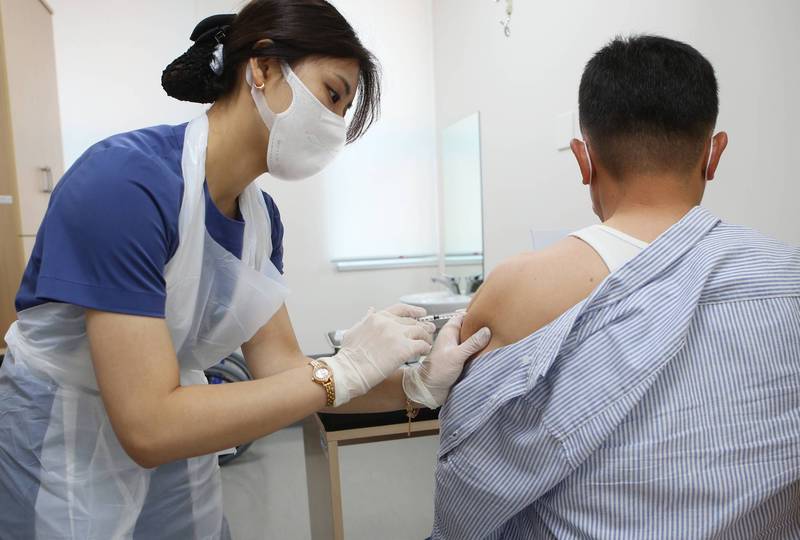 南韩完整接种疫苗的覆盖率已逼近6成，但突破性感染的病例也激增。（欧新社资料照）(photo:LTN)