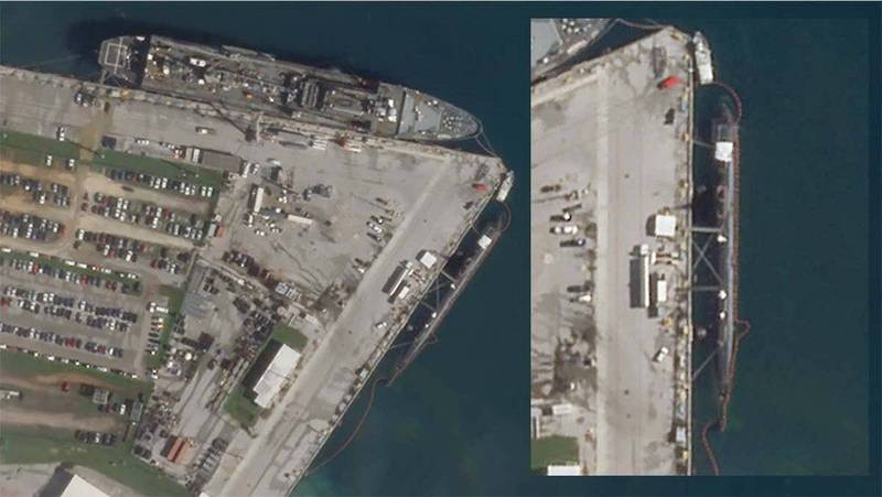 「康乃狄克號」發生撞擊後首度曝光衛星照顯示，該核潛艦目前可能停靠在關島的碼頭上。（圖擷自推特）