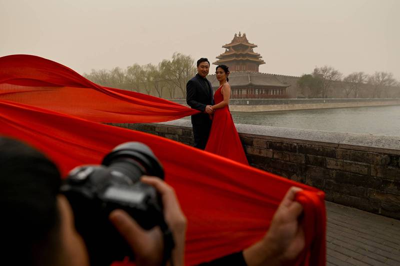 中国北京官方今天宣称新增2例确诊，其中1名患者为职业摄影师，发病前曾至饭店担任婚摄。示意图。（法新社档案照）(photo:LTN)