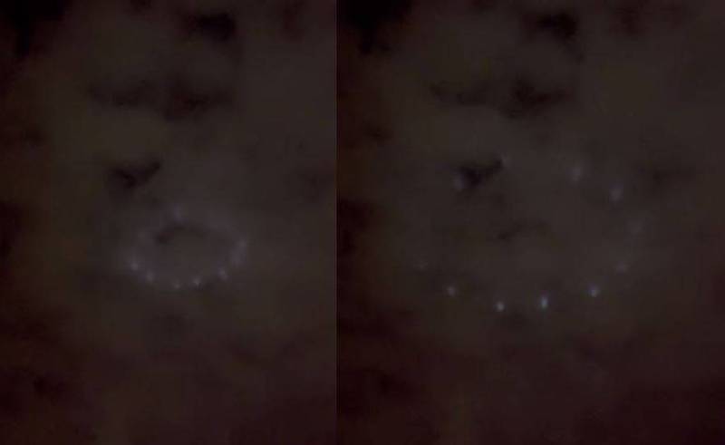一名網友近日發現南投埔里的天空出現12個奇怪光影，隨即用手機錄影並上網發問「天空怎出現這景象？求解」，就有當地人跳出來說明，其實那是「中台禪寺的12道雷射光」。（圖取自臉書「埔里人」）