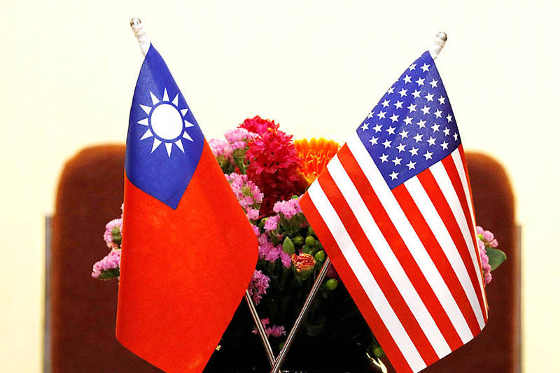 The national flags of Taiwan and the US are pictured on a table for a meeting between then-US representative Ed Royce and then-legislative speaker Su Jia-chyuan in Taipei on March 27, 2018.
Photo: Tyrone Siu, Reuters