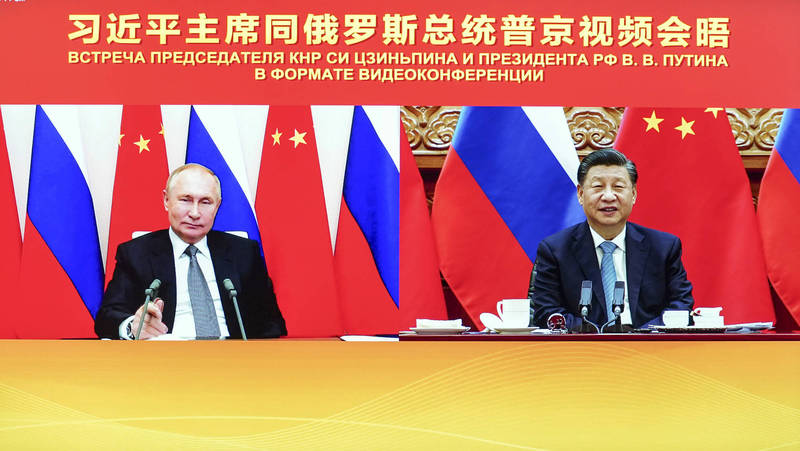 中国国家主席习近平昨（15）日与俄罗斯总统普廷进行视讯会面。（美联社）(photo:LTN)