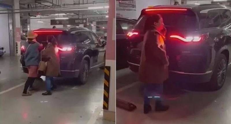 中國一名駕駛遇到2名人肉佔車位的女子，直接打檔倒車硬是將車輛停進停車格內，下車後狠狠瞪了想上前怒罵的女子後就直接離開，影片曝光讓網友紛紛喊讚。（圖取自微博）