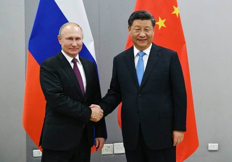 中国领导人习近平（右）与俄国总统普廷（左）关系密切，传中媒获令对俄国不利新闻不发。（美联社）(photo:LTN)