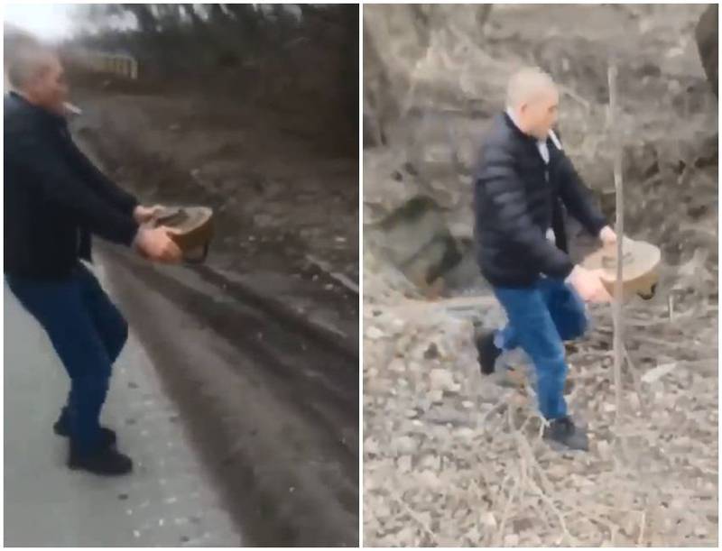 画面中这名乌克兰大叔一边叼着菸，一边徒手移除地雷。（图翻摄自The New Voice of Ukraine推特）(photo:LTN)