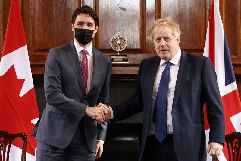 除了与女王见面，杜鲁道也与英国首相强森会晤。（法新社）(photo:LTN)