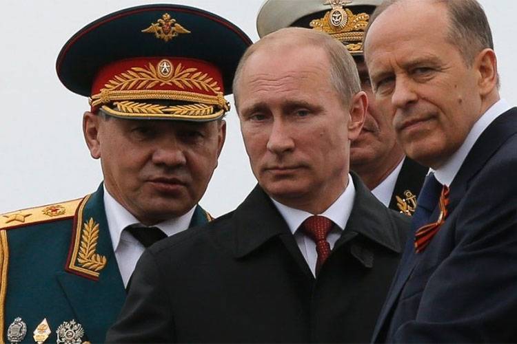 俄罗斯总统普廷（中）与他的两大心腹俄国联邦安全局（FSB）局长波特尼科夫（右），以及国防部长绍伊古（左）。（路透）(photo:LTN)