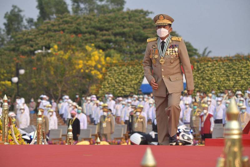 緬甸軍方推翻民選政府並血腥鎮壓民主抗議人士已滿一年，軍政府領導人敏昂萊今天主持年度軍人節閱兵儀式。（法新社）