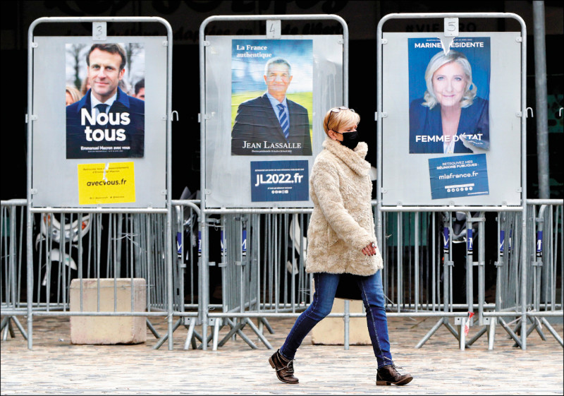 法国10日举行总统大选首轮投票，共有12名候选人角逐，其中以极右派勒班（图右）对现任总统马克宏（图左）最具威胁性。（欧新社）(photo:LTN)