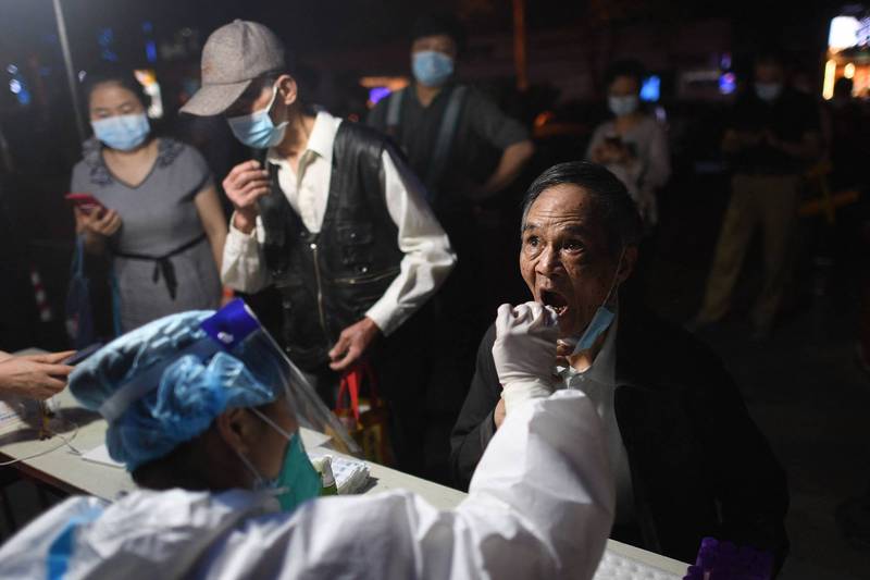 上海单日确诊数近期不断飙升，今上午上海市卫健委通报，过去一天新增本土病例2万6330例。（法新社）(photo:LTN)