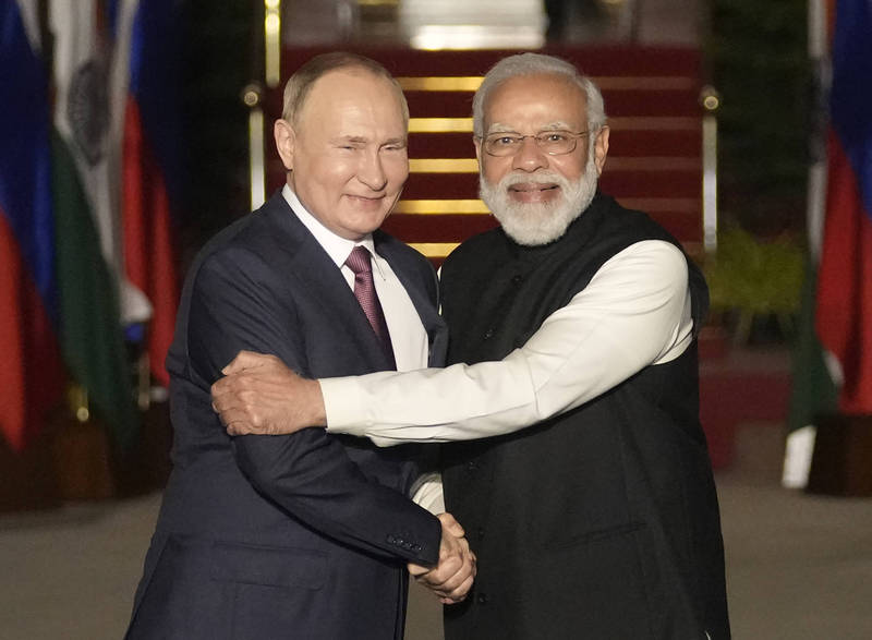俄罗斯总统普廷（Vladimir Putin，图左）与印度总理莫迪（Narendra Modi，图右）。（美联社资料照）(photo:LTN)