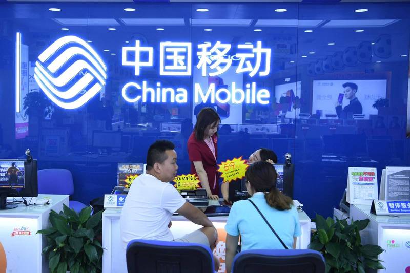 中國移動的多區電信業者，據上級主管部門要求，為打擊境外詐騙電話事件，將「默認關閉」用戶接聽國際及港澳台電話之功能。示意圖。（中央社）