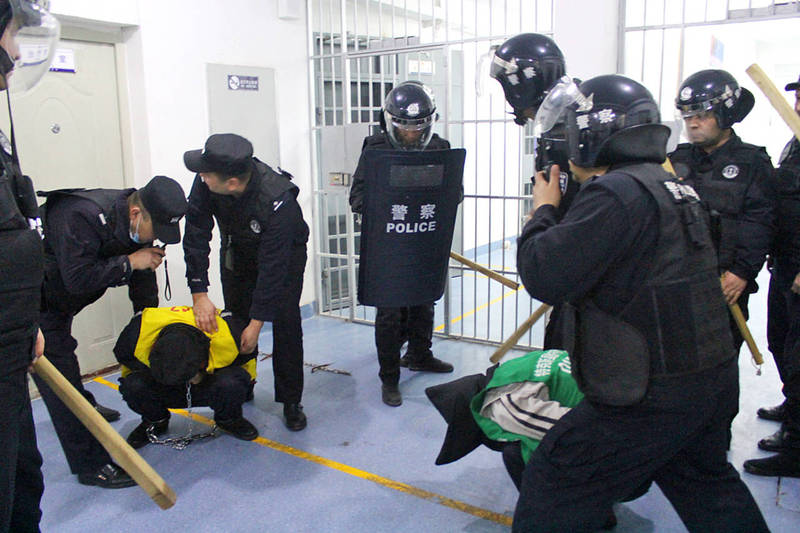 This undated handout image released by The Victims of Communism Memorial Foundation on May 24, 2022, shows SWAT team personnel engaged in an apparent anti-escape or anti-riot drill at the Tekes County Detention Centre in the Xinjiang Region of western China in February 2018. - A leak of thousands of photos and official documents from China`s Xinjiang has shed new light on the violent methods used to enforce mass internment in the region. The files, obtained by academic Adrian Zenz, were published as UN human rights chief Michelle Bachelet begins a long-awaited and controversial trip to Xinjiang.
Photo: AFP
