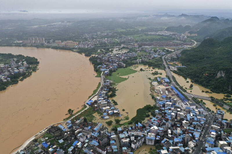 受強降雨影響，中國廣西柳州市近日發生山洪災害，截至昨日上午已發現至少5人死亡。（資料照，美聯社）