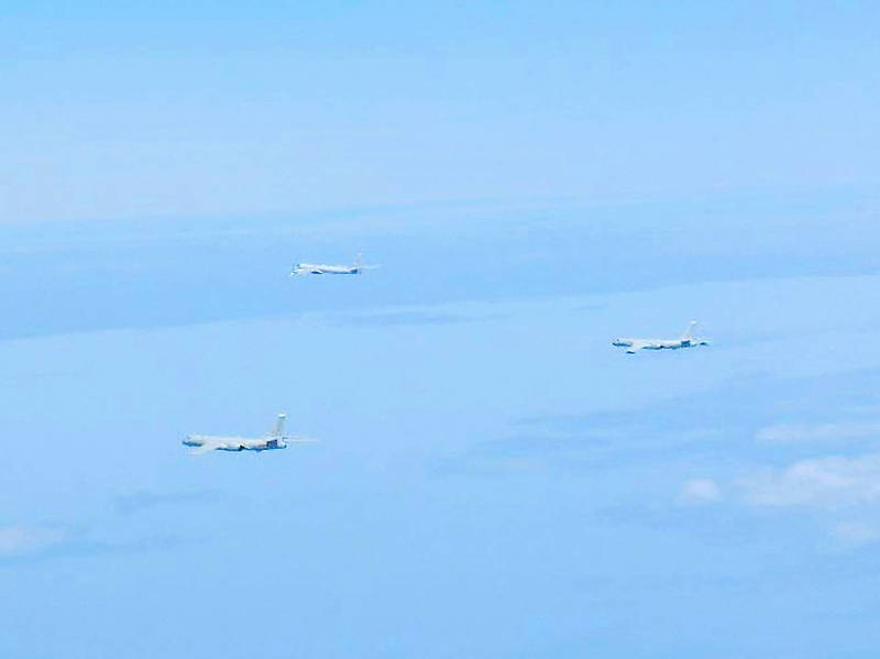 Russian and Chinese bombers fly above the East China Sea in a photograph taken by the Japan Air Self-Defence Force and released by the Japanese Ministry of Defense’s Joint Staff Office on May 24.
Photo: Reuters
Russian and Chinese bombers fly above the East China Sea in a photograph taken by the Japan Air Self-Defence Force and released by the Japanese Ministry of Defense’s Joint Staff Office on May 24.
Photo: Reuters