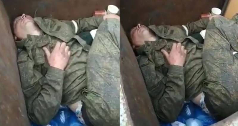 一名俄军士兵喝到烂醉躲到垃圾桶里唿唿大睡，引来乌克兰人围观讪笑。（图取自推特）(photo:LTN)