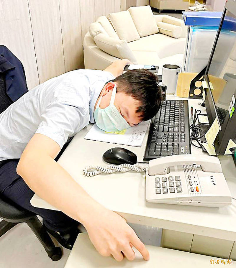 A man rests his head on his desk in an undated photograph.Photo: Liao Hsueh-ju, Taipei Times