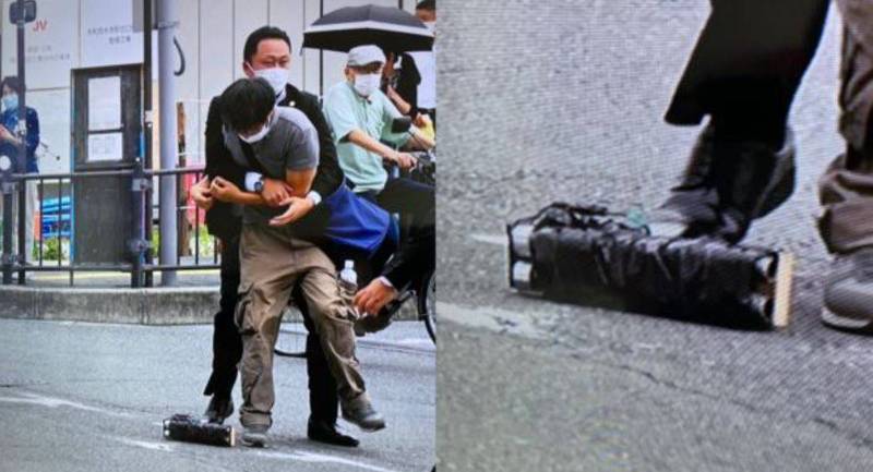 《NHK》报导指出，枪手当时将枪枝伪装成相机长镜头，混在人群中，连开两枪直到第二枪击中安倍倒下。（图取自推特）(photo:LTN)