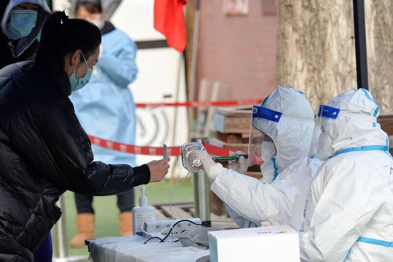 中国疫情再起，天津市展开全市核酸检测。（法新社）(photo:LTN)